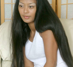 Amateur asian babe spreads her legs wide to show her wet twat