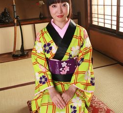 Beautiful raven haired Japanese darling bares her natural boobies