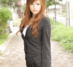 Stunning redhead office lady Rina Kikukawa posing outdoors with joy