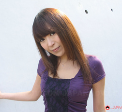 Slutty brunette porn queen Jun Kusanagi teasing her twat outdoors